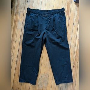 faded black pleated dress pants